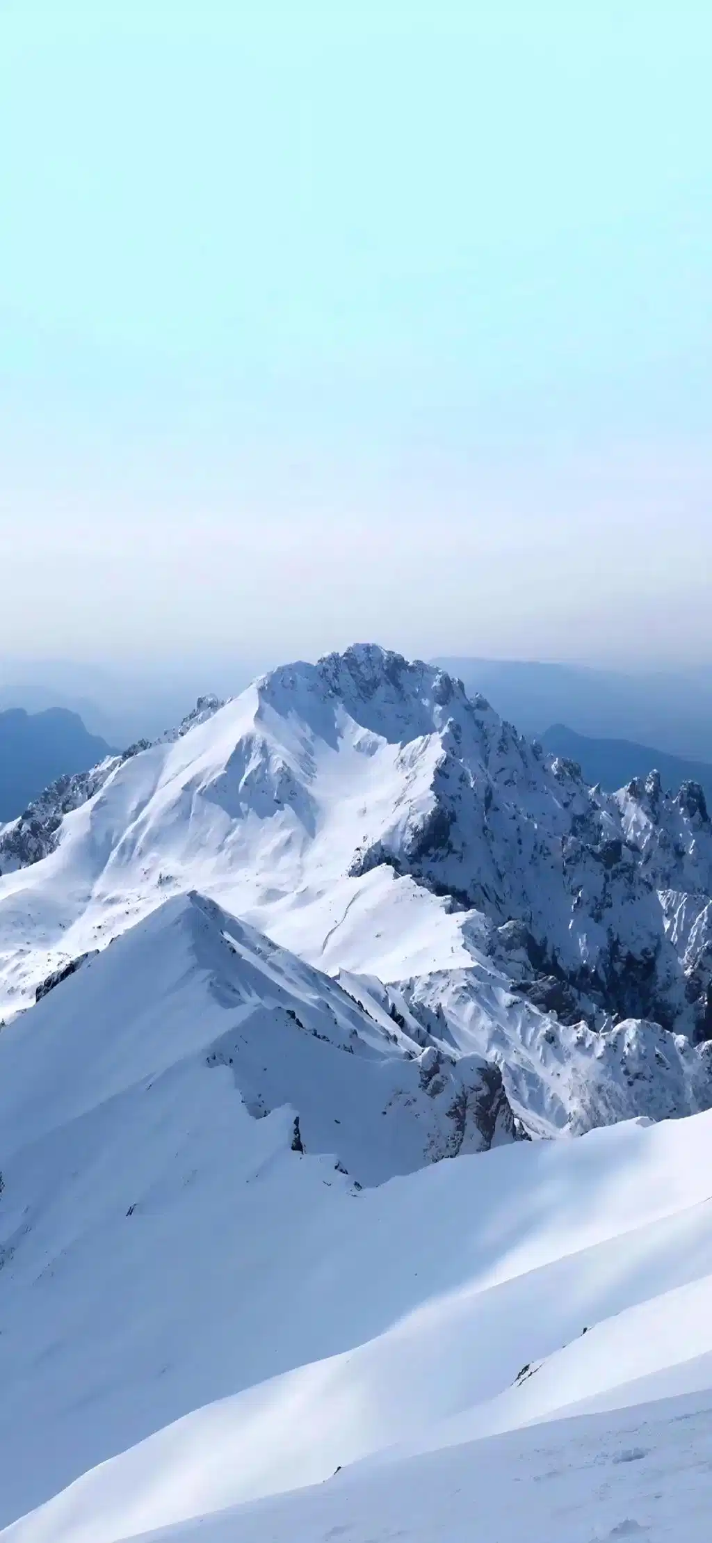 Massive Snow Mountain Range Blue Sky