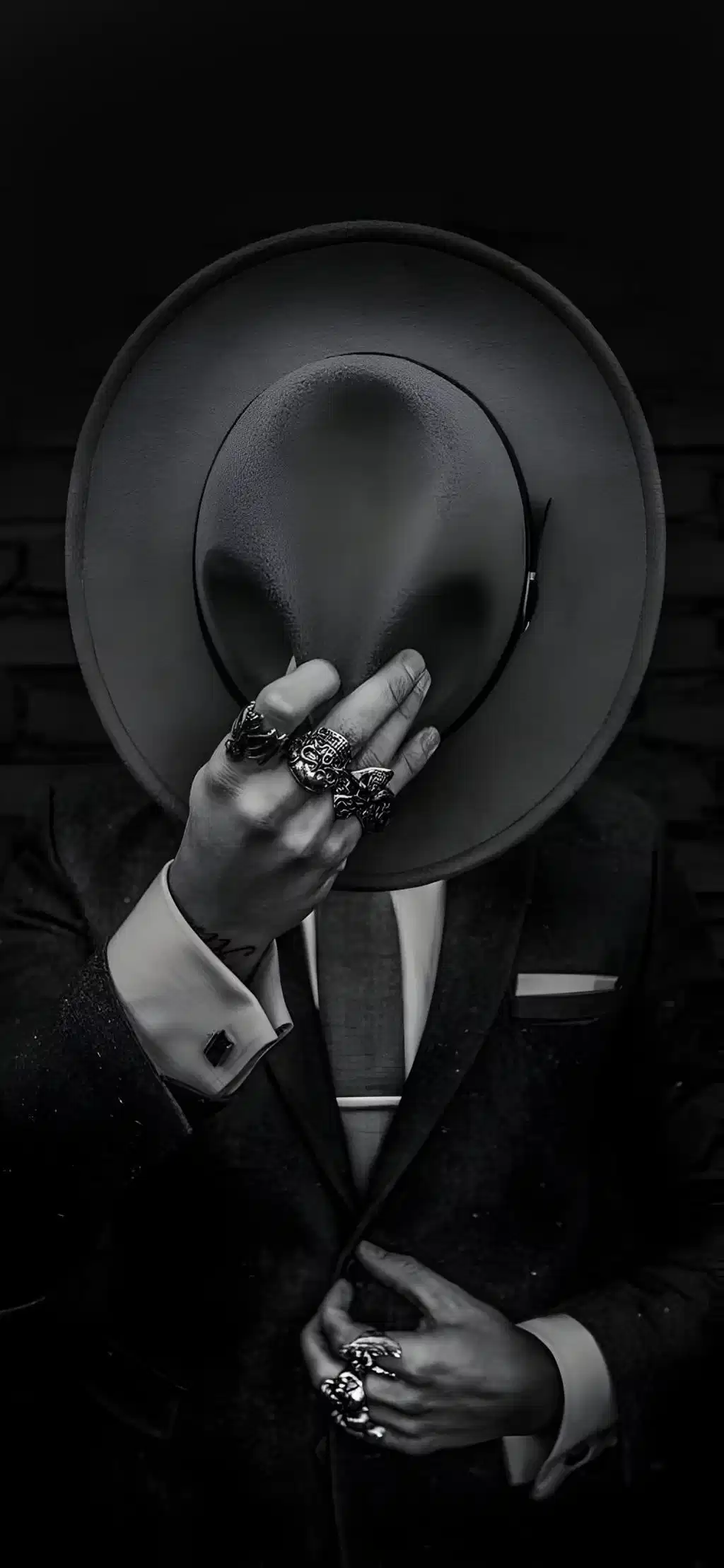 Man In Suit Holding Fedora Hat Shadows