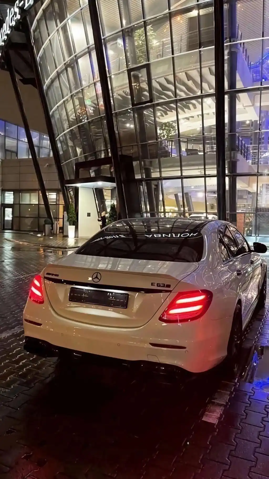 White Luxury Sports Sedan City Street Night