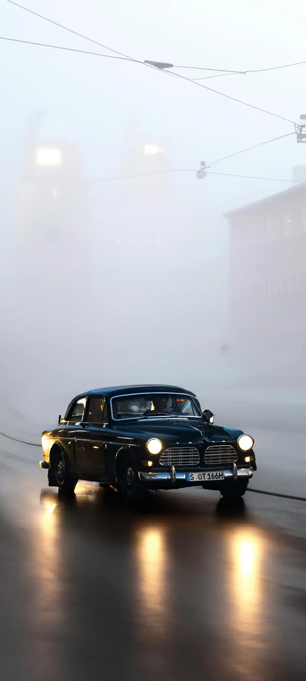 Classic Black Car Headlights Foggy Night